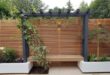 simple backyard landscaping along fence