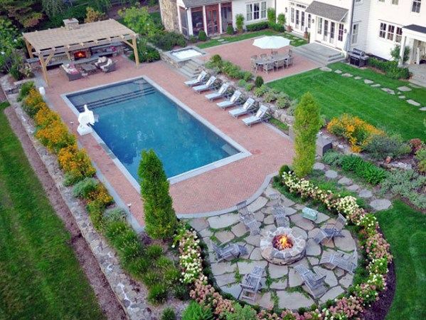 A Beautiful Oasis: Backyard Patio Designs Featuring a Pool