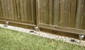 simple backyard landscaping along fence