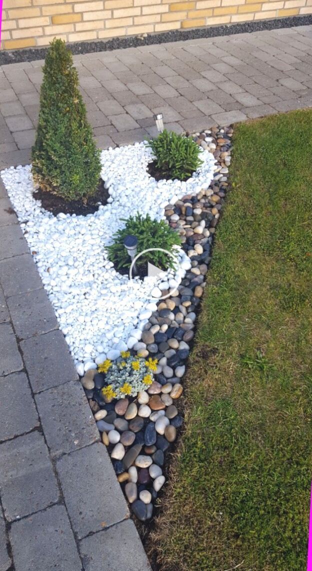 Creating an Attractive Flower Bed with Rocks in Front of Your House