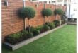 simple backyard landscaping along fence