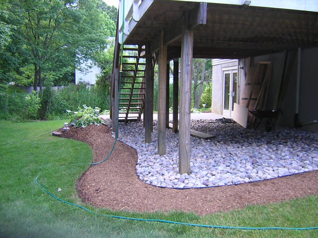 Creating an Inviting Outdoor Oasis with Under Deck Landscaping