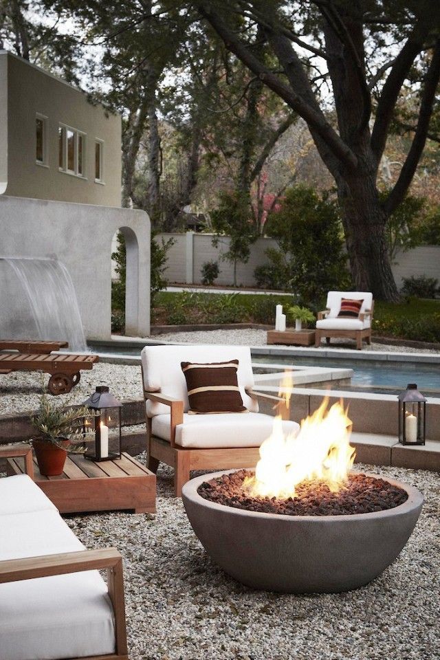 Creative patio design ideas featuring a cozy fireplace