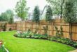 simple backyard landscaping along fence