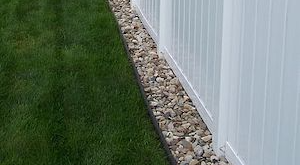 simple backyard landscaping along fence