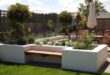 raised flower beds in front of house