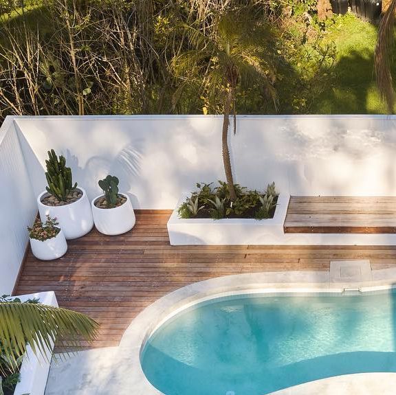 Enhance Your Poolside Eden: Creative Landscaping Ideas for Your Swimming Oasis