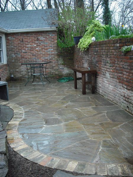 Enhancing Outdoor Spaces with Beautiful Flagstone Patio Designs