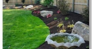 simple backyard landscaping along fence