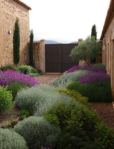 Enhancing Your Outdoor Space with Artfully Shaped Landscaping Mounds