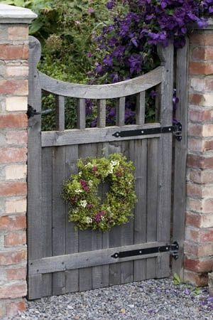 Enter Your Garden in Style with These Charming Gate Options