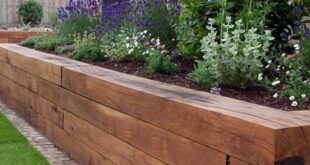 raised flower beds in front of house