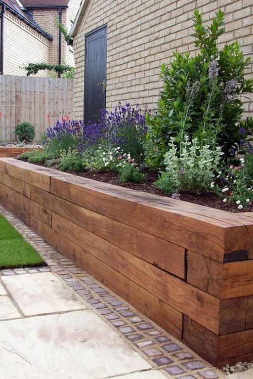 raised flower beds in front of house