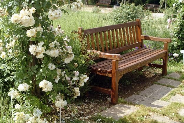 The Charm of Wooden Garden Benches