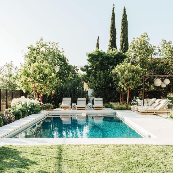 Transform Your Backyard with Stunning Pool and Patio Designs