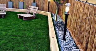 simple backyard landscaping along fence