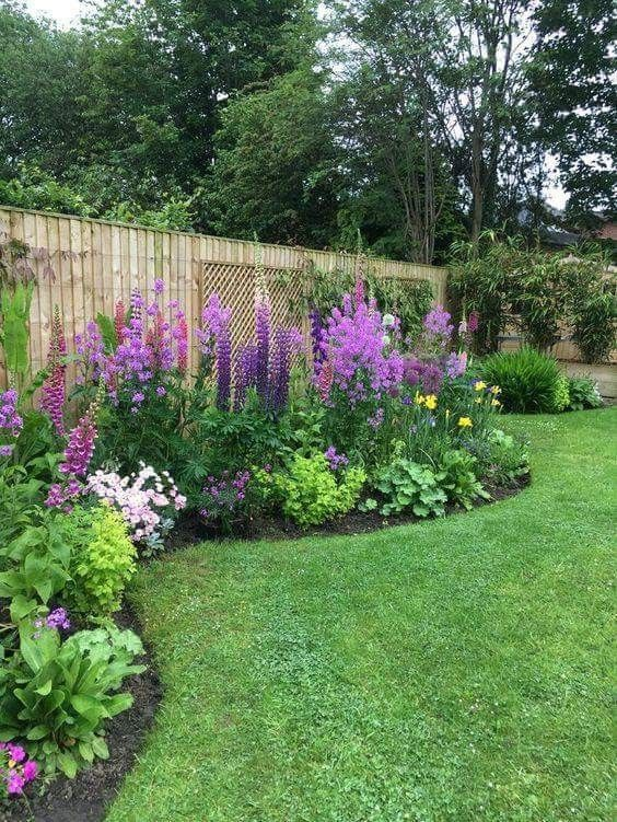 raised flower beds in front of house