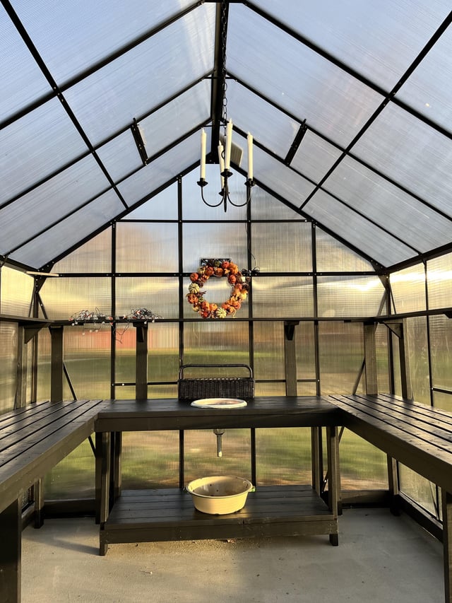 Our backyard greenhouse! We added a small greenhouse to our little .