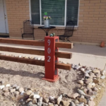 DIY Cinder Block Fence with 4x4's Rai