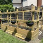 I built my sister a raised and enclosed garden bed. : r/woodworki