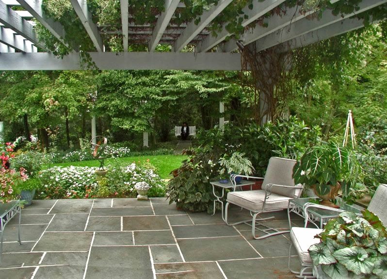 Flagstone Patio Ideas, Cost & How To Install - Landscaping Netwo