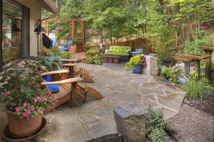 Flagstone Patio Ideas, Cost & How To Install - Landscaping Netwo