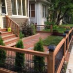 Small Front Yard with Red Shale and Wood Pave