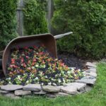 DIY Tipped Wheelbarrow Planter - The Honeycomb Ho