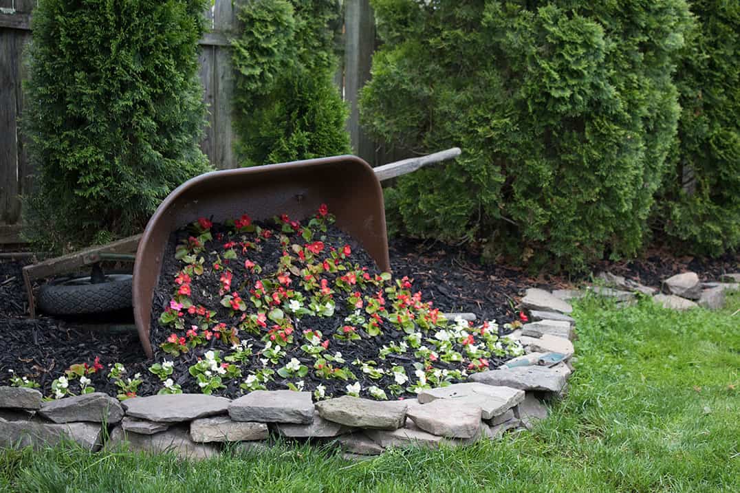 DIY Tipped Wheelbarrow Planter - The Honeycomb Ho