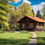 Wooden house near a forest. The park of Vrana Palace in Sofia .