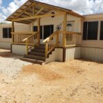 Wooden front porch | Mobile home porch, Home exterior makeover .