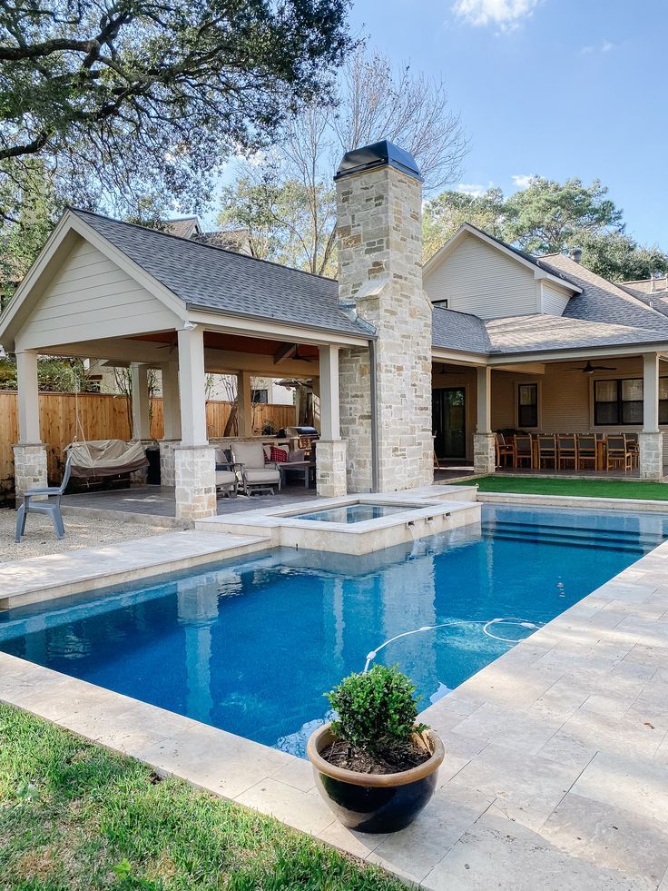 Outdoor Oasis: Pool and Covered Kitchen Design Ide