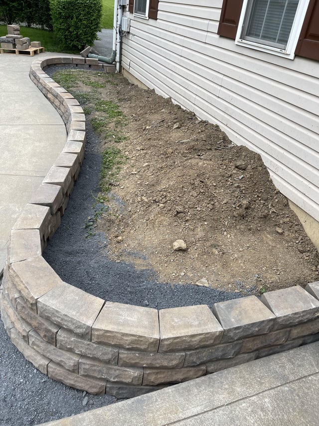 Small garden bed retaining wall I started today. What do I use to .