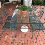 Wrought Iron Outdoor Patio Table With Glass Top And (4) Chairs 54W .